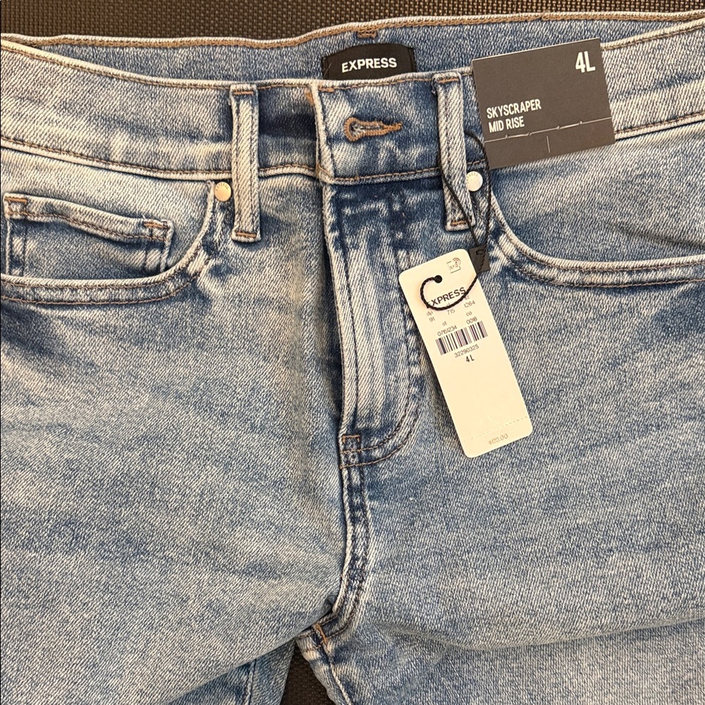 Express Women’s Skyscraper Mid Rise Jeans — Light Wash Blue